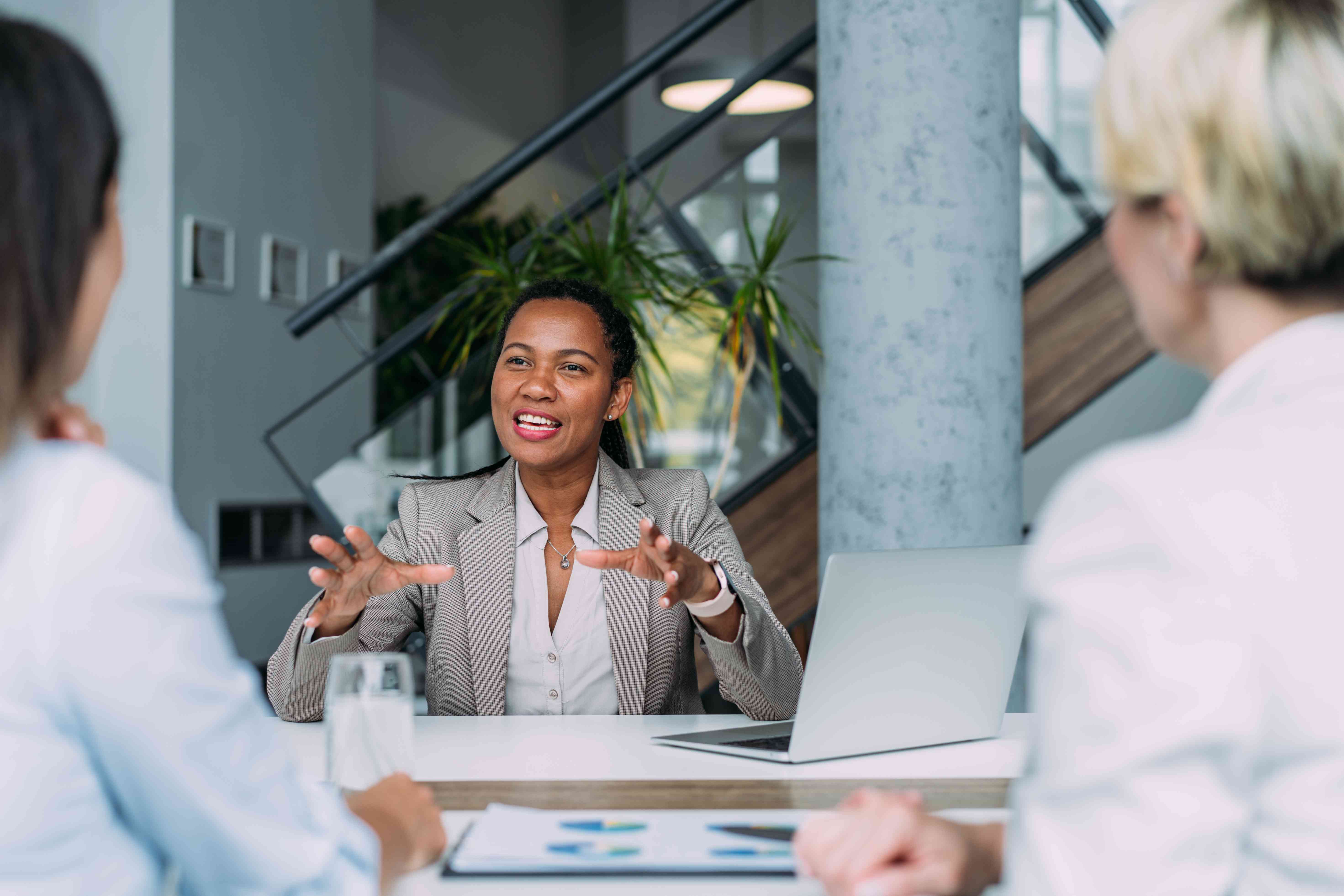 Financial advisor discussing investments with clients