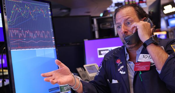 Traders work on the floor of the New York Stock Exchange 