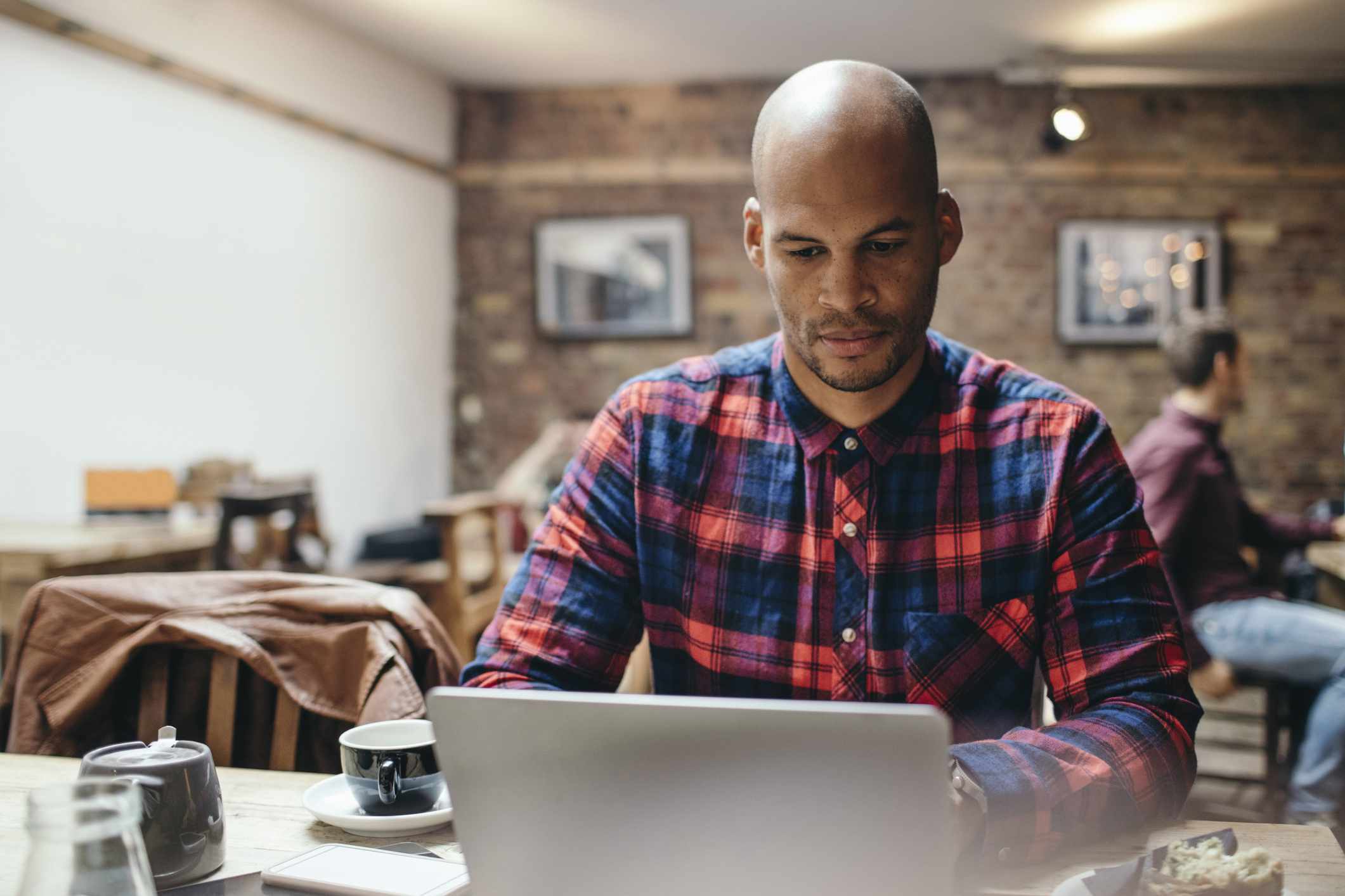 A person compares interest rates for different loans